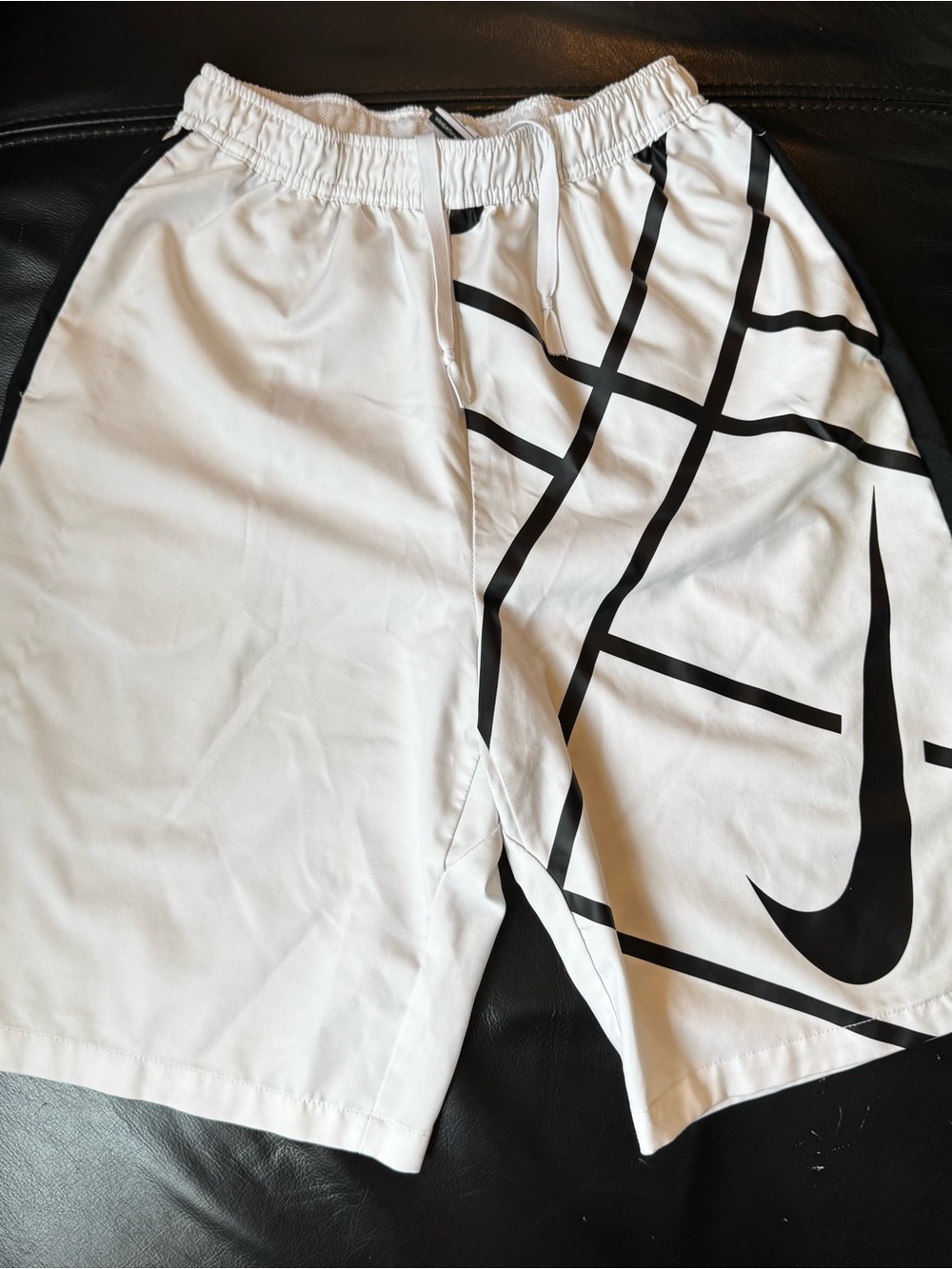Nike Men’s White Athletic Shorts with Black Graphic